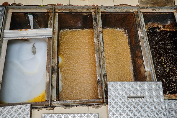 pumping, jetting, and enzyme treatments are common methods used for grease trap maintenance